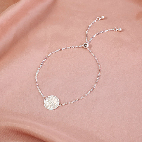 Silver Round textured glow-in-the-dark shrink bracelet Silver Round textured glow-in-the-dark shrink bracelet