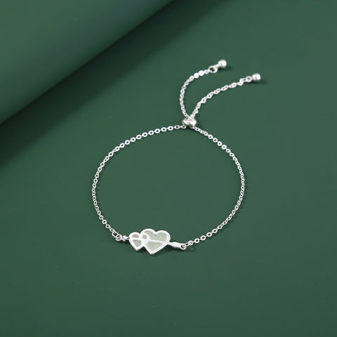 Glow-in-the-dark couple love heart silver bracelet Glow-in-the-dark couple love heart silver bracelet