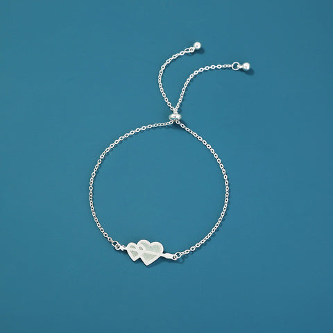 Glow-in-the-dark couple love heart silver bracelet Glow-in-the-dark couple love heart silver bracelet