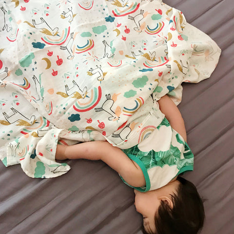 Baby holding a blanket towel double-layer yarn bamboo newborn baby towel