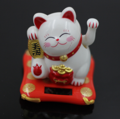 Hand-cranked cats, solar-powered car decorations, ornaments